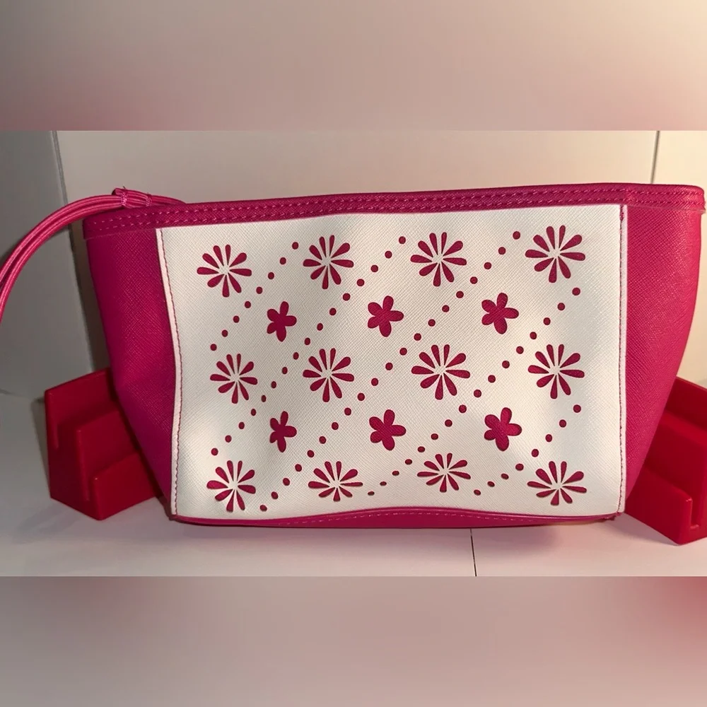 Vera Bradley Pink and White Laser Cut Floral Wristlet.